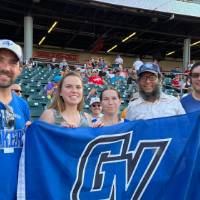 Alumni at the baseball game.